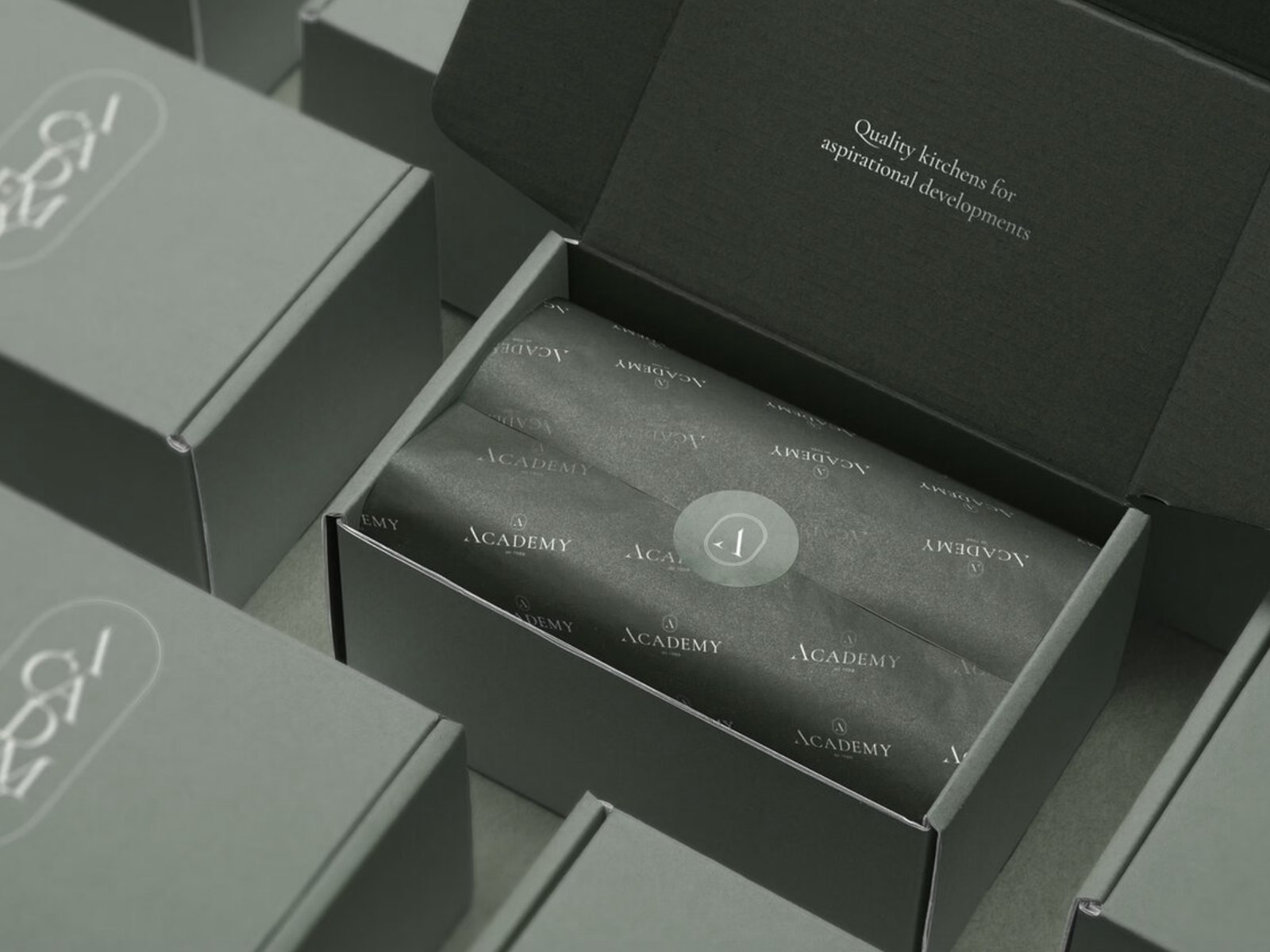 Academy Kitchens branded packaging — rebrand by HDEY