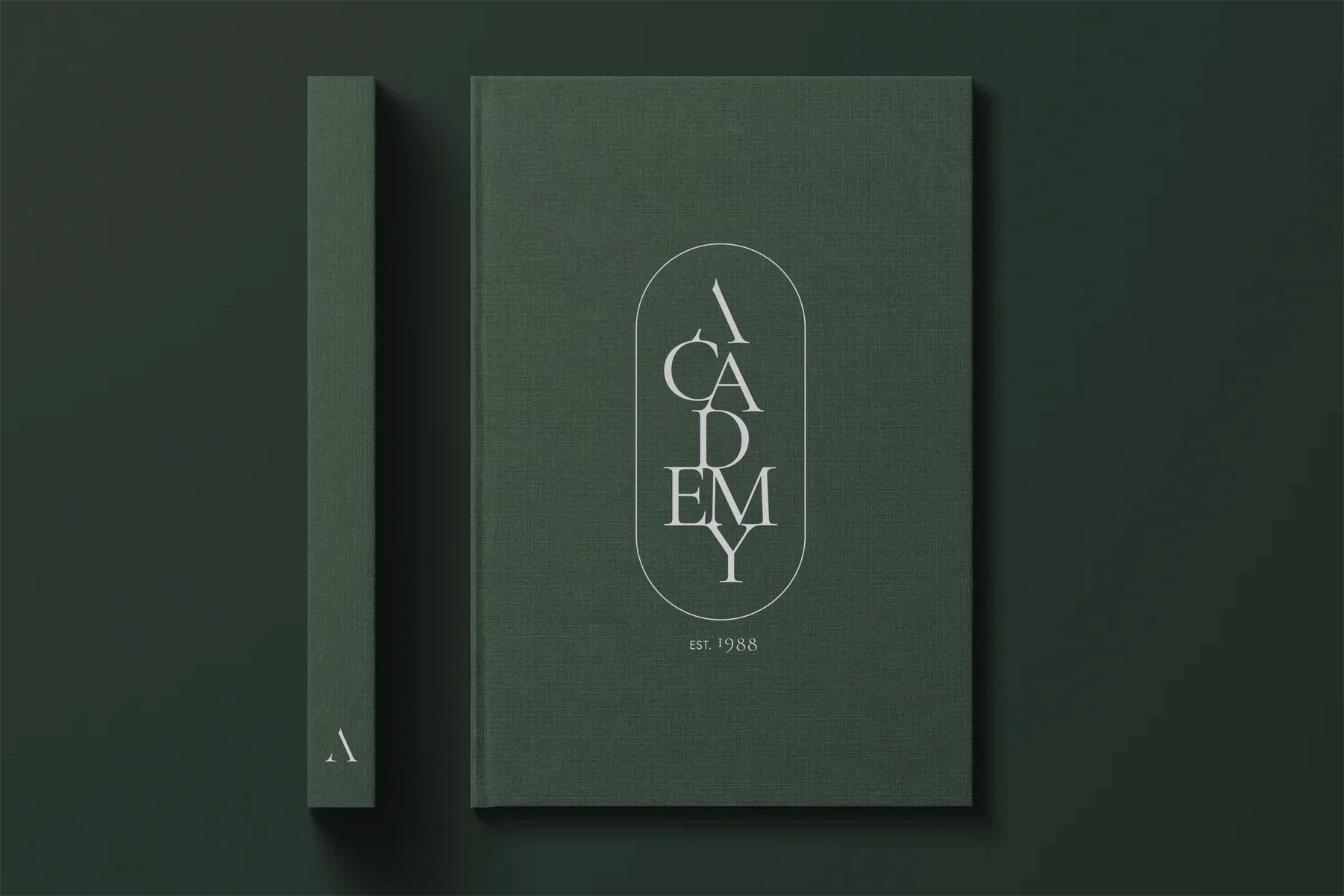 Academy Kitchens brochure cover in sage green with the vertical ACADEMY logotype and EST. 1988 — brand identity by HDEY