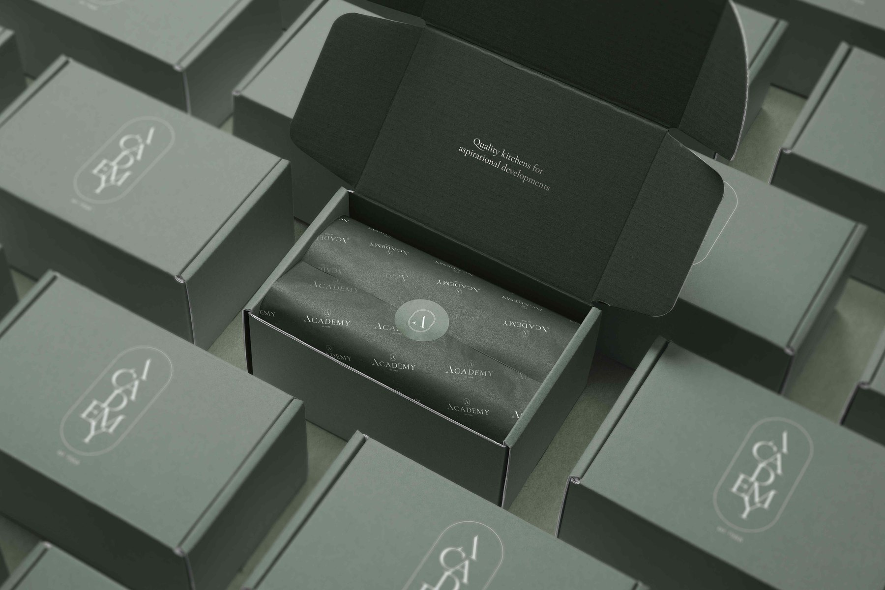 Academy Kitchens branded sample boxes arranged in a grid, packaging design by HDEY