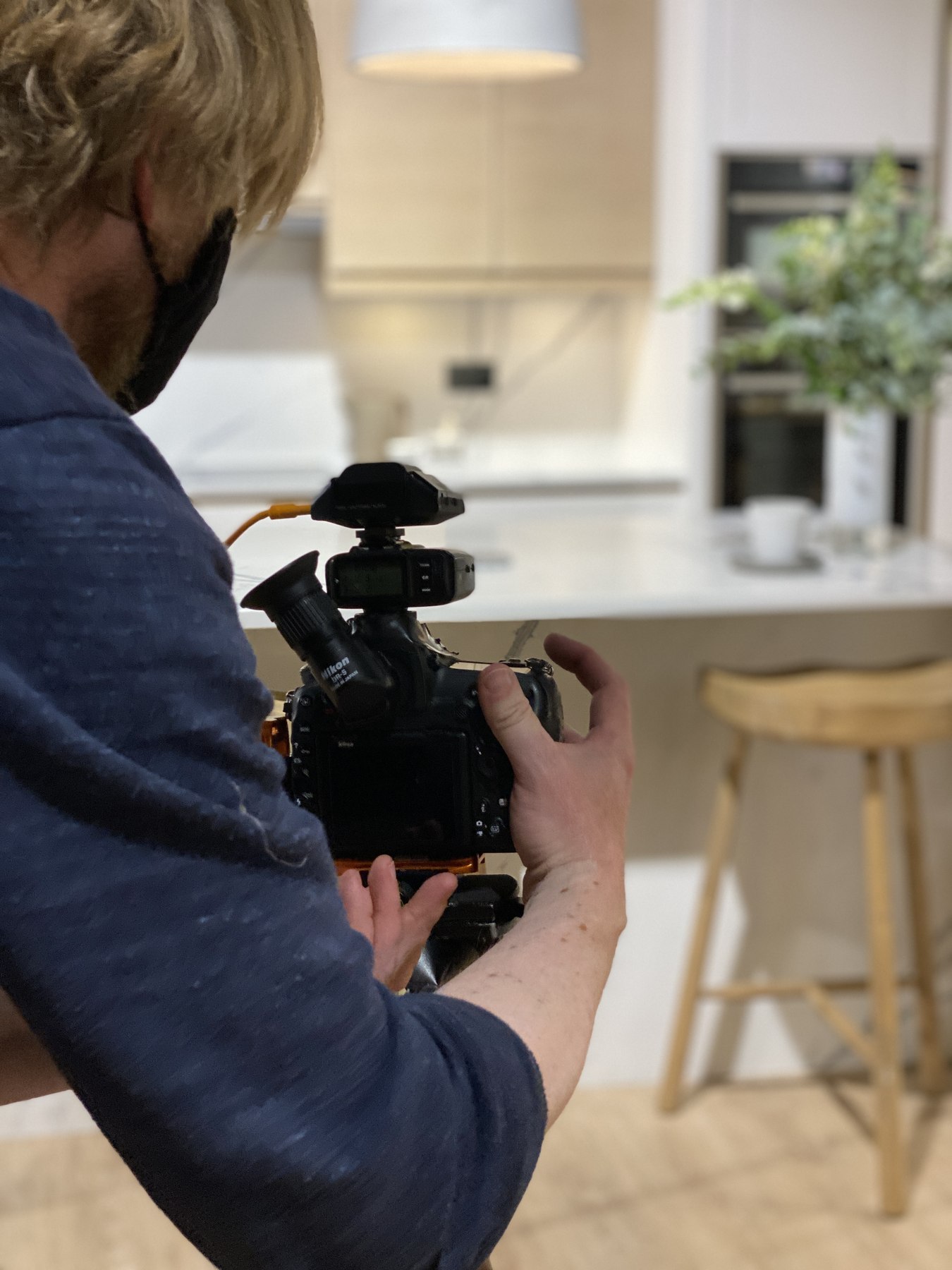 Photographer shooting an Academy Kitchens kitchen on a Nikon D850 during the brand photoshoot, art direction by HDEY