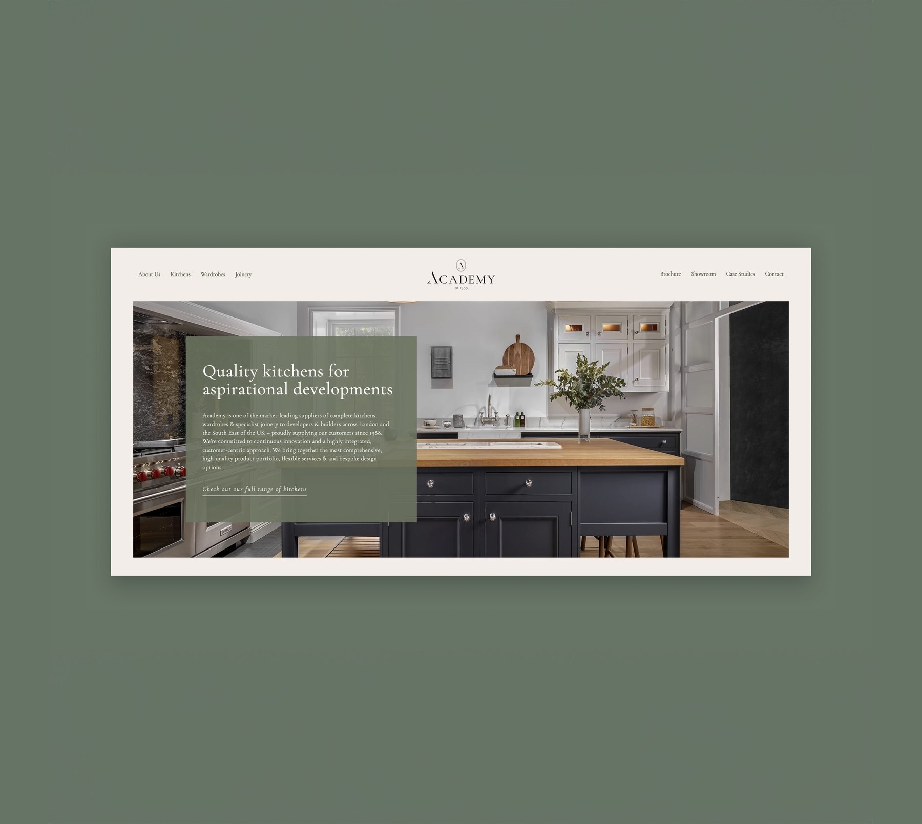 Academy Kitchens website homepage with the strapline Quality kitchens for aspirational developments over a navy shaker kitchen, web design by HDEY