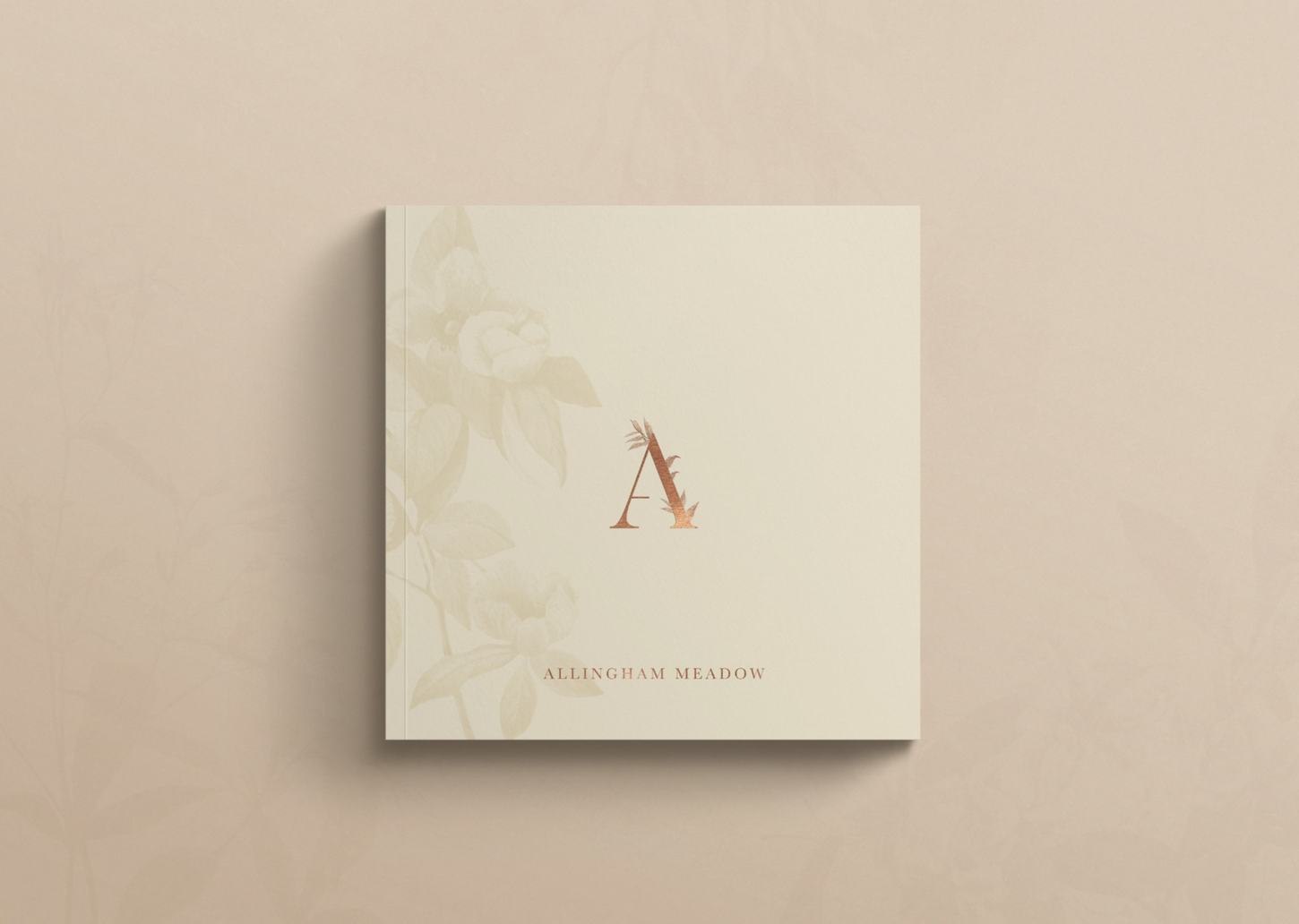Allingham Meadow brochure cover in warm stone with a foiled A, print design by HDEY