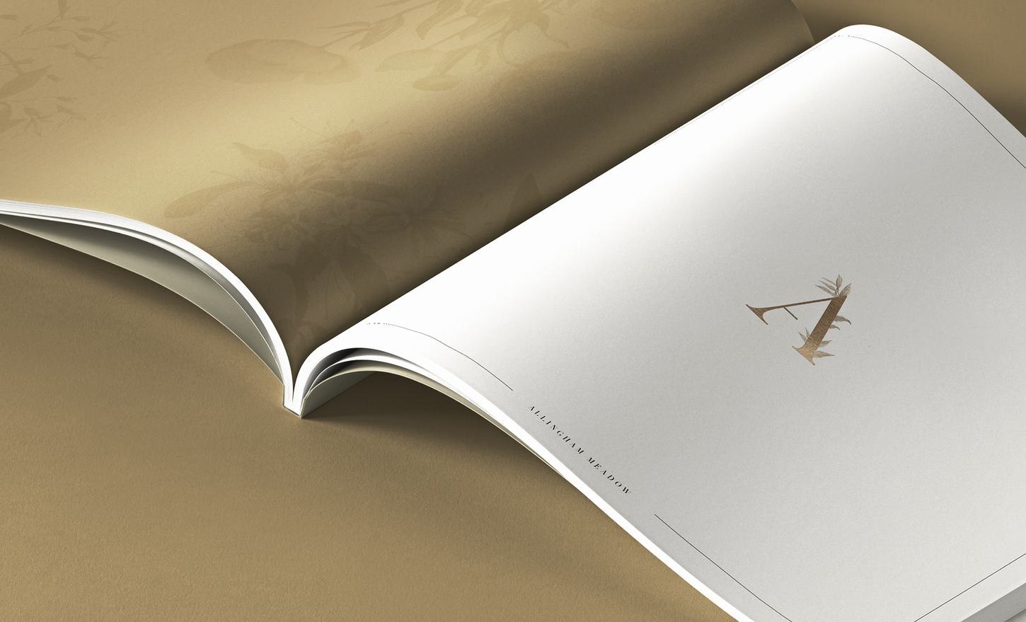 Allingham Meadow brochure open showing gold foil detailing, print design by HDEY