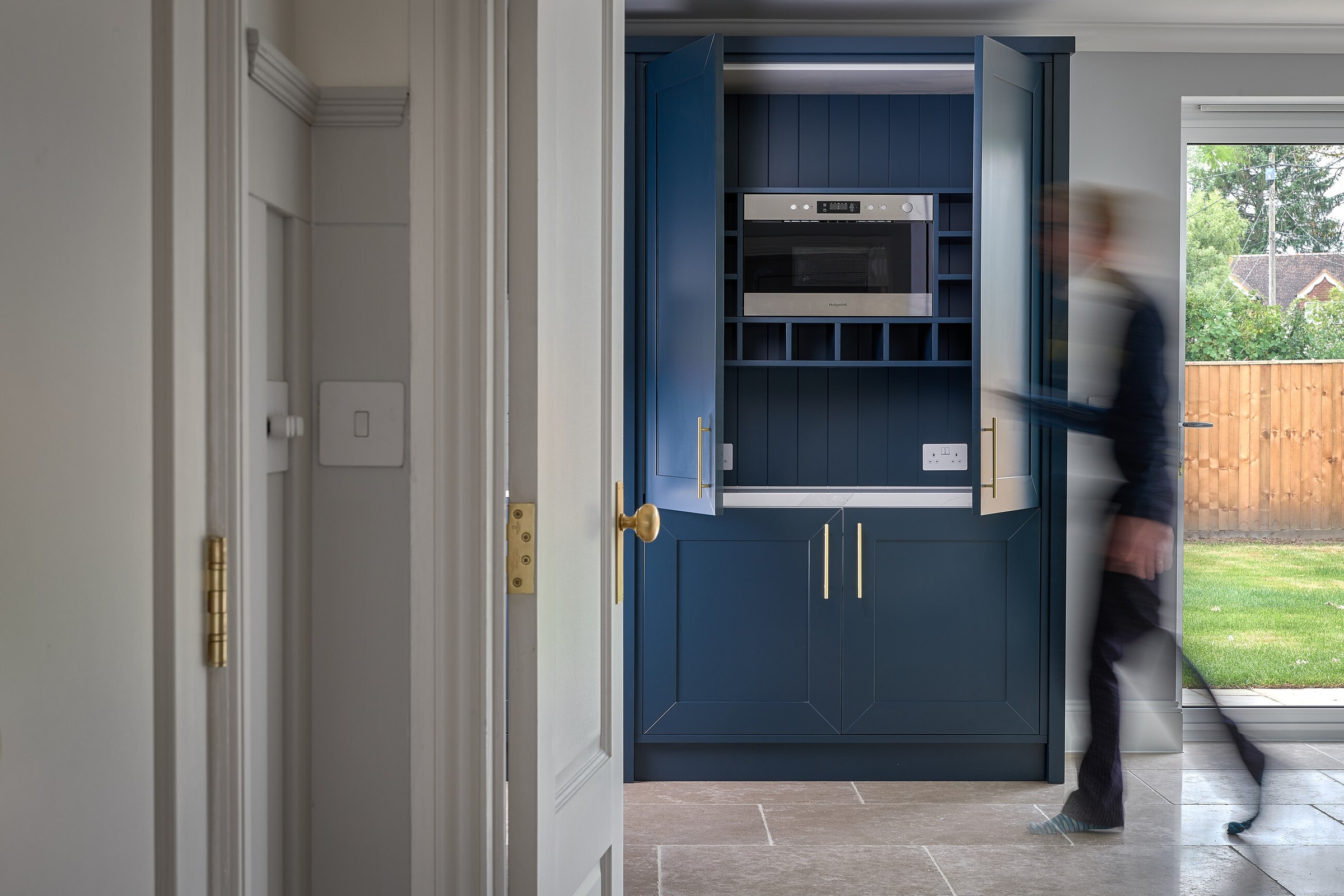 Brompton Gardens completed larder unit in navy with integrated appliances, West End, Woking