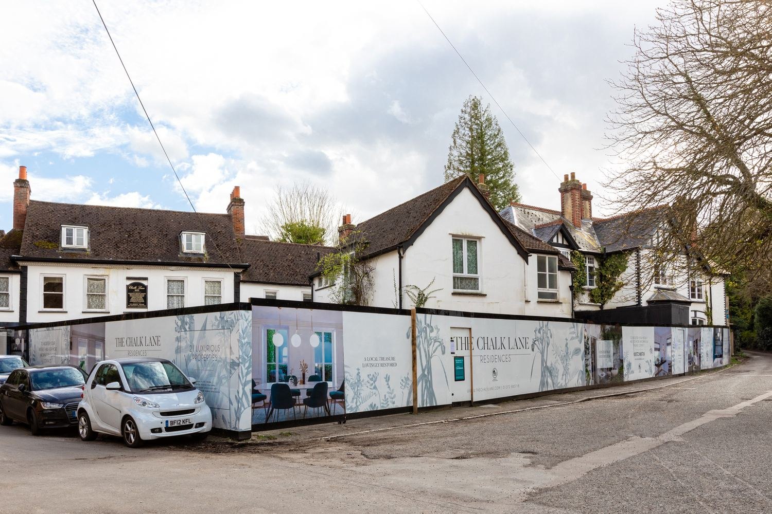 The Chalk Lane Residences site hoarding along the street, Epsom — by HDEY