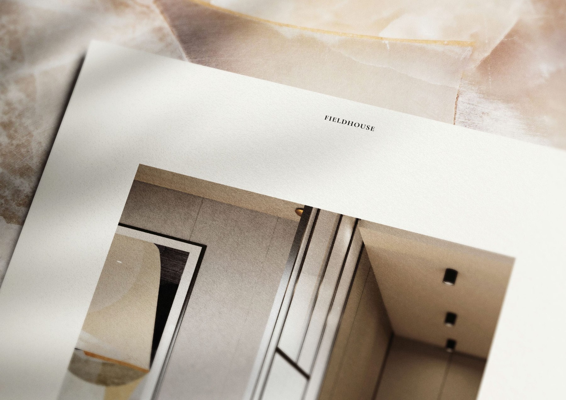 Fieldhouse brochure page with the logotype above full-bleed interior photography, print design by HDEY