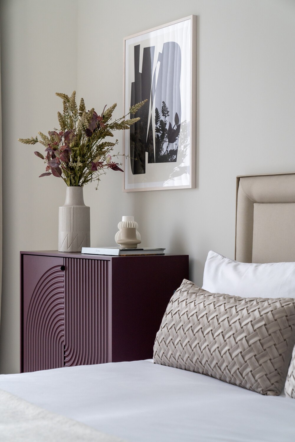 Hannell House show home bedroom with plum fluted cabinet and upholstered headboard, Fulham, by HDEY