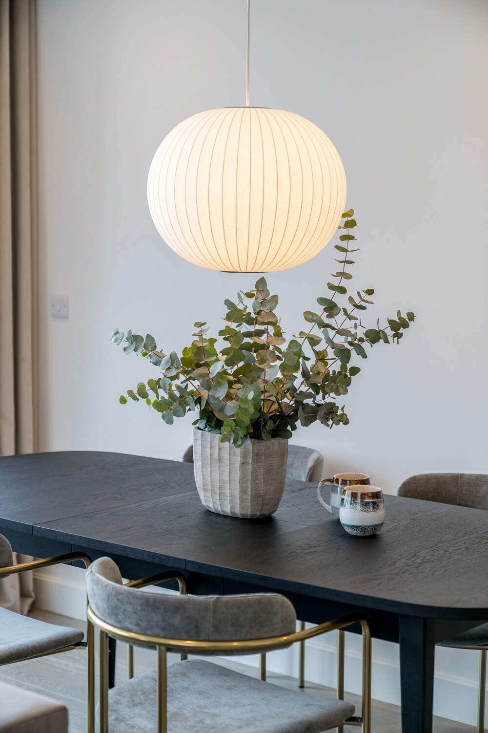 Hannell House show home dining table with ribbed pendant and velvet chairs, Fulham, by HDEY