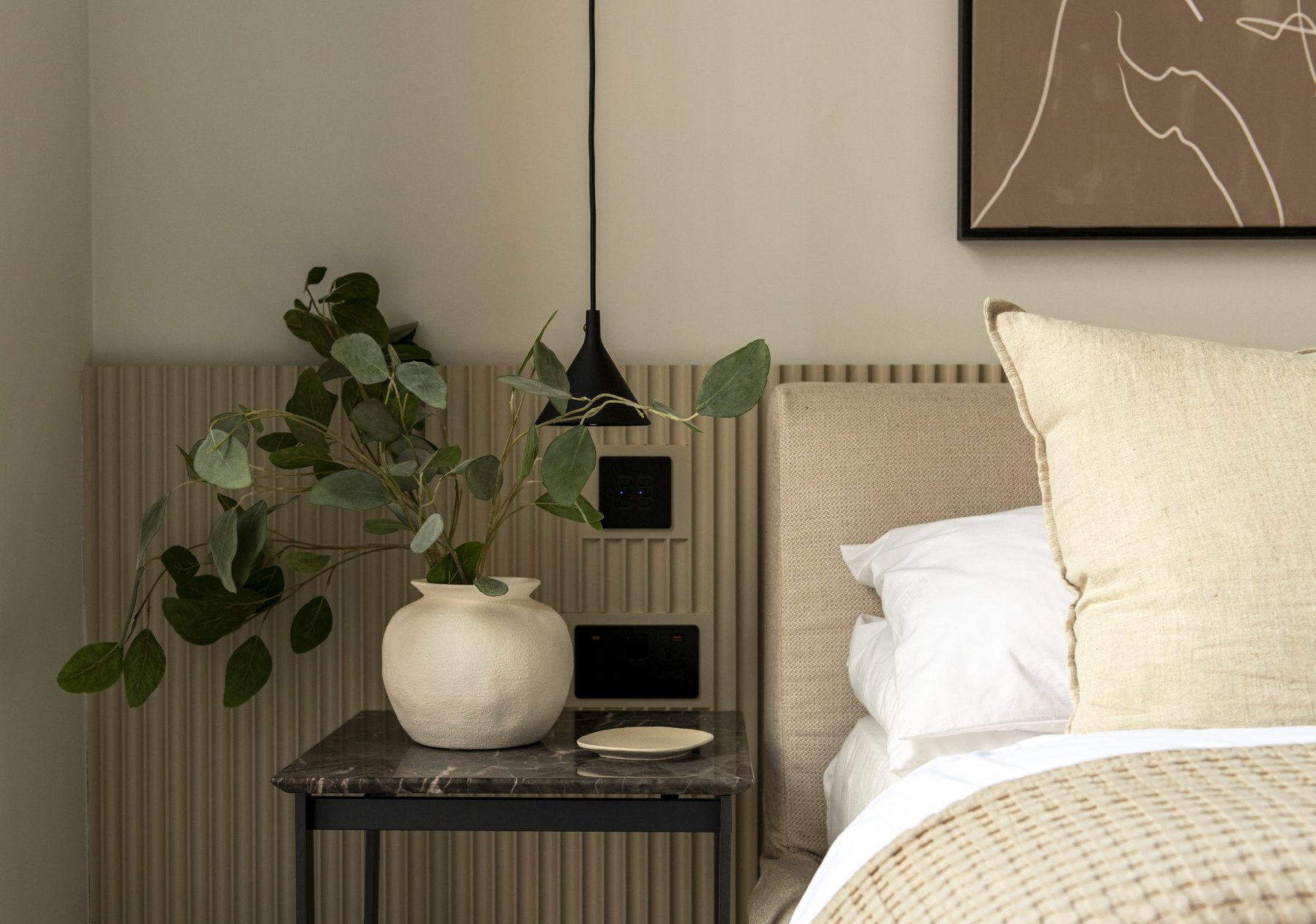 Ivy Gardens bedroom detail with pendant light and marble side table, Ealing — lighting design by HDEY