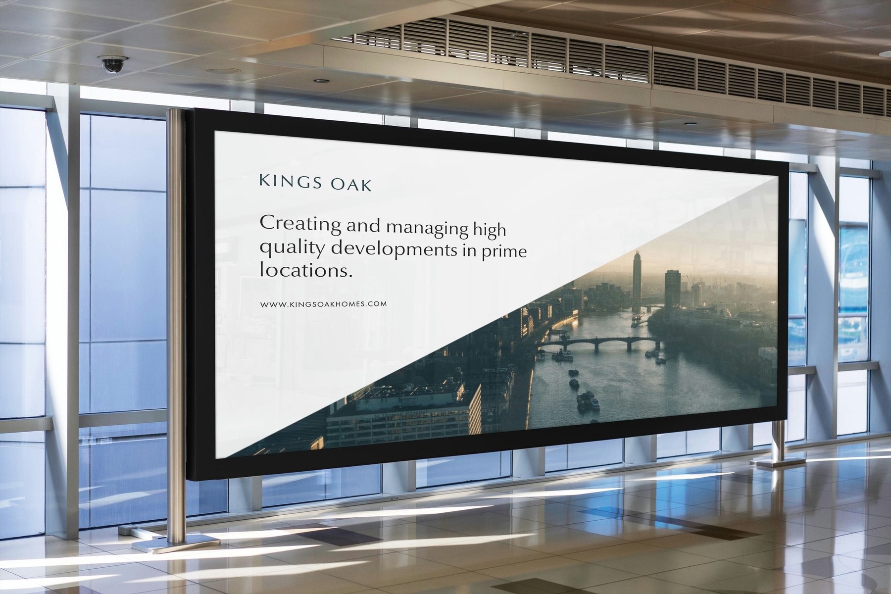 Kings Oak billboard in petrol blue with the logotype, advertising design by HDEY