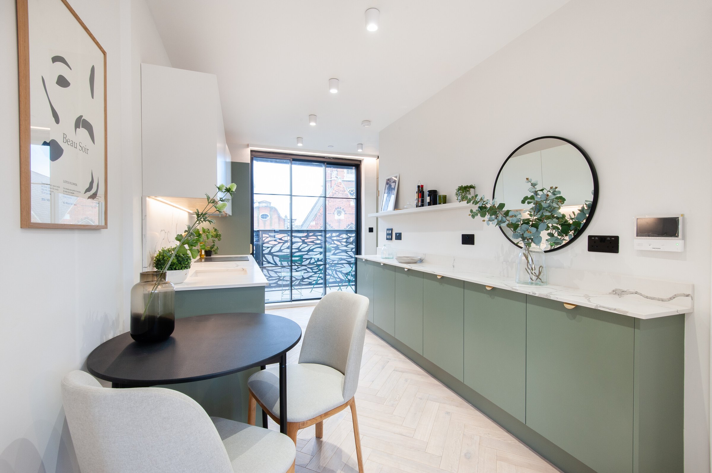 Market Place kitchen and dining area in a bespoke green with Calacatta worktops, Acton, by HDEY