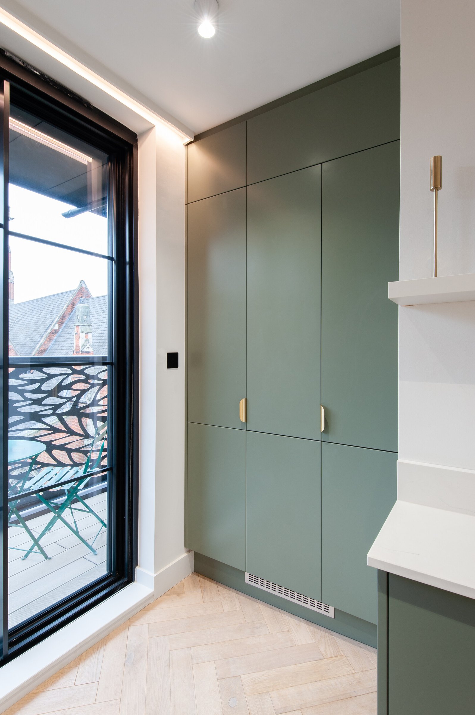Market Place concealed utility cupboard beside the balcony doors, Acton, by HDEY