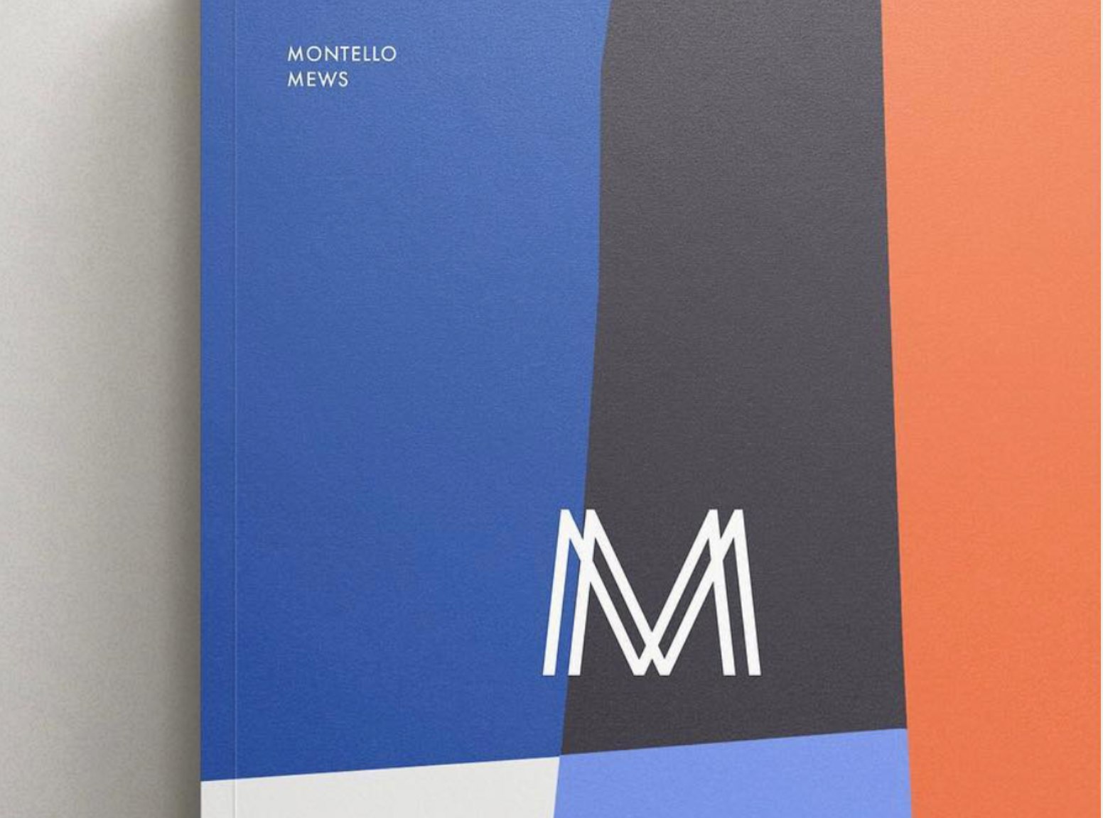 Montello Mews brochure cover detail showing the interlocking M monogram, brand identity by HDEY