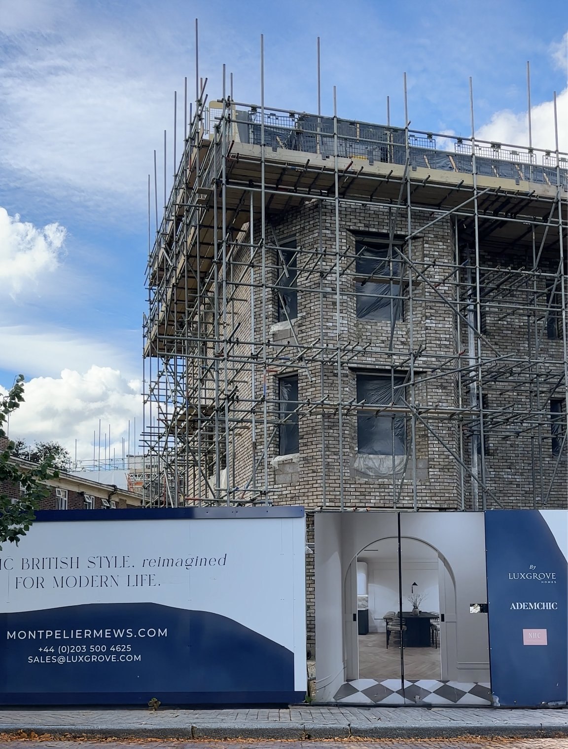 Montpelier Mews marketing hoarding installed on site, Ealing — property branding by HDEY