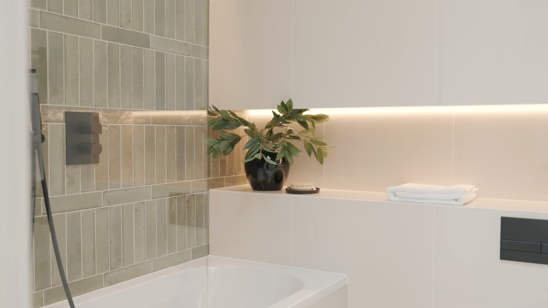 Montpelier Mews bathroom with glazed tiles and freestanding bathtub, Ealing — interior design by HDEY