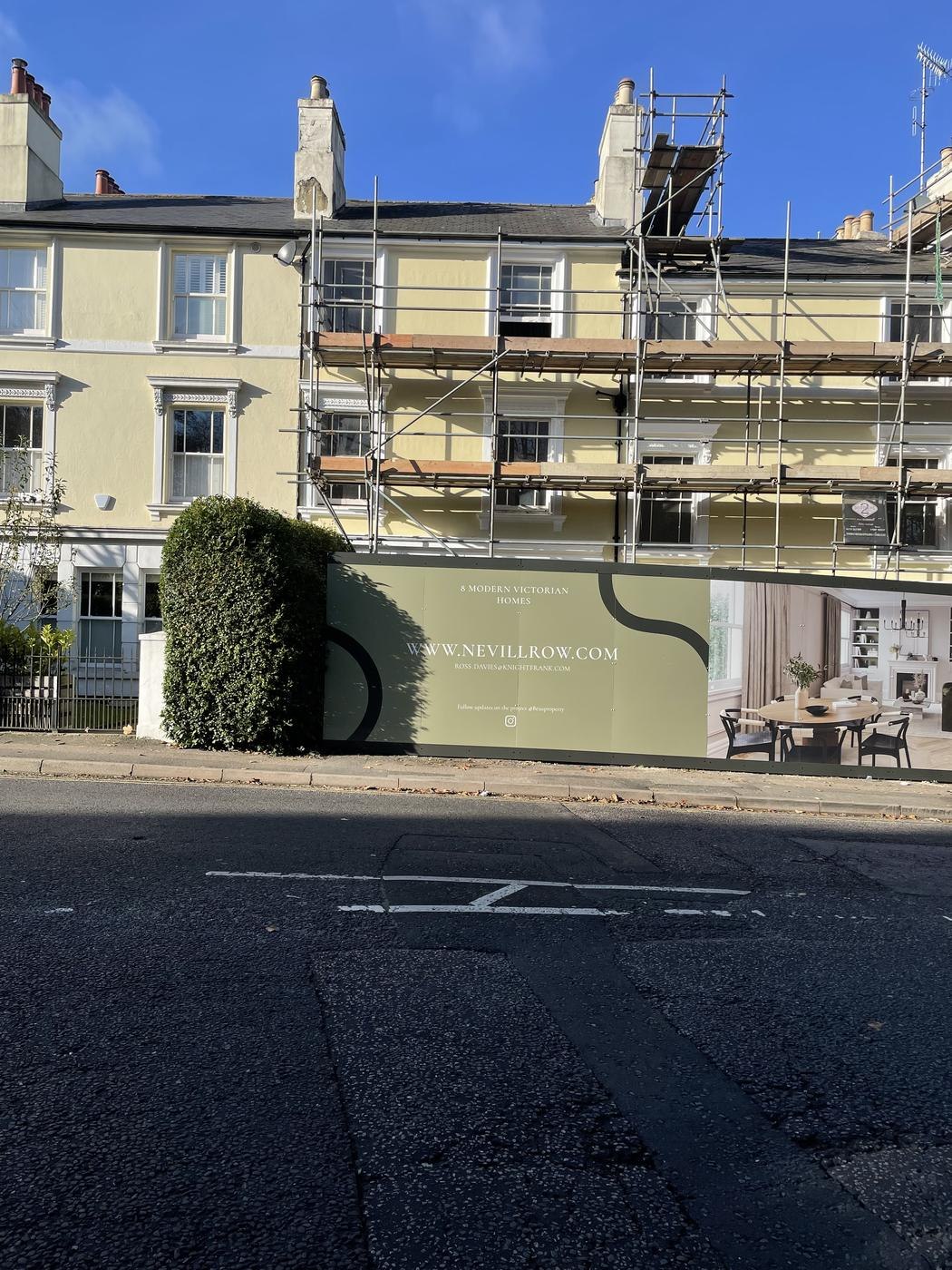 Nevill Row hoarding along the street showing CGIs and the web address, Royal Tunbridge Wells — by HDEY
