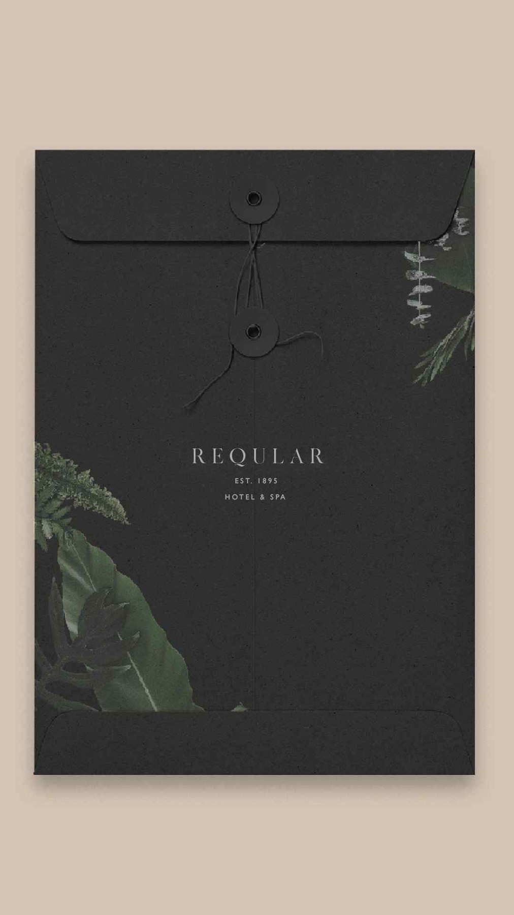 Reqular document envelope in near-black with the logotype in white and botanical illustration at the corners, print design by HDEY