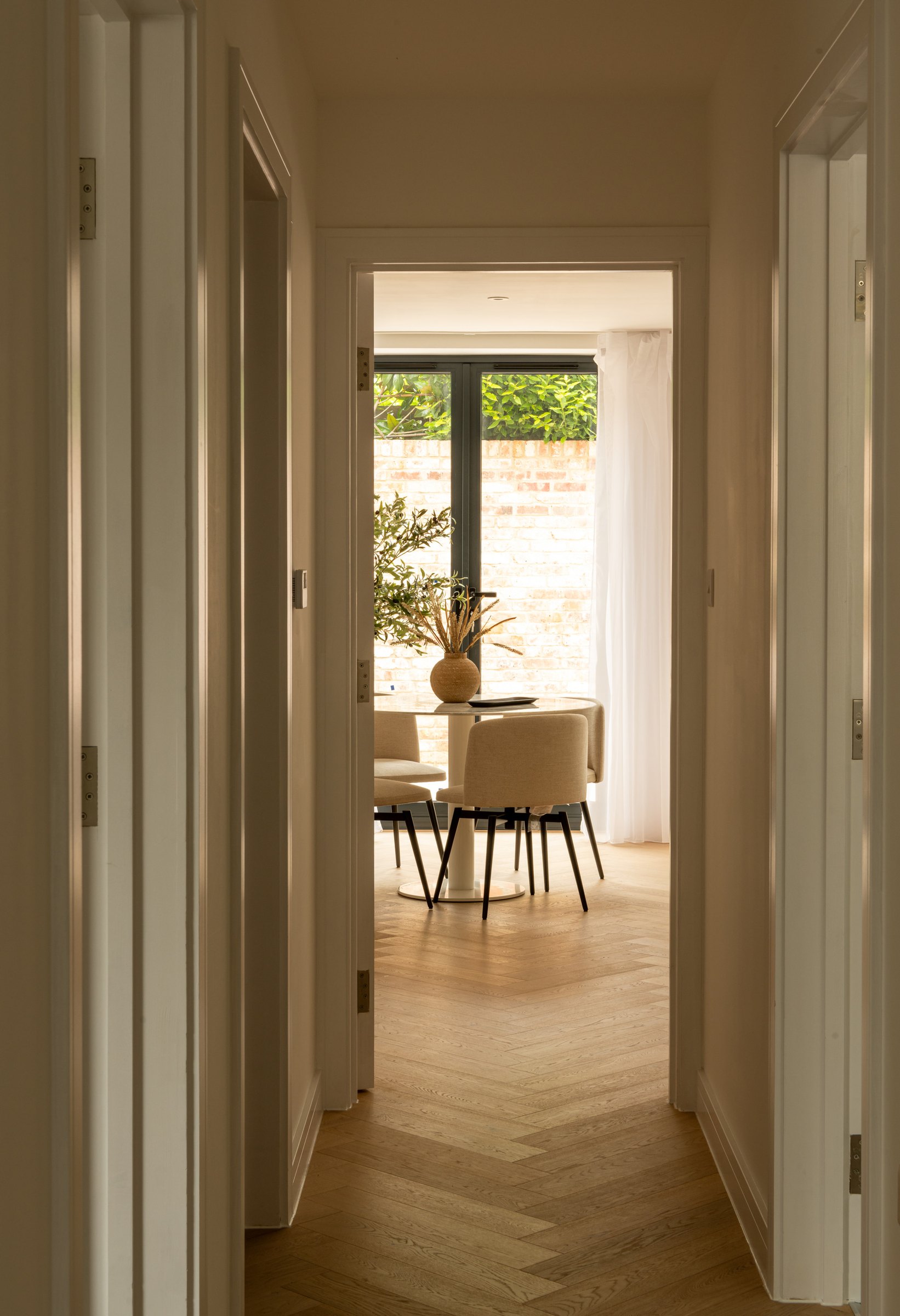 Robson Road show home hallway looking through to the dining area, West Dulwich, styled by HDEY