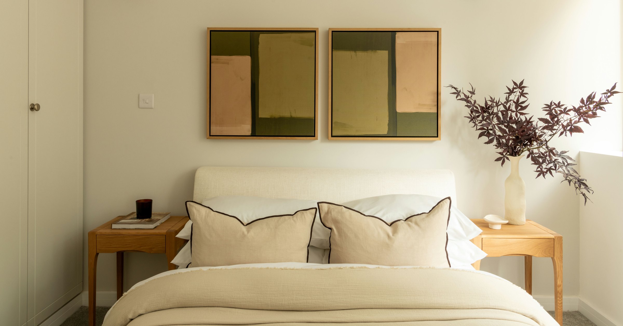 Robson Road show home principal bedroom with paired artwork above the bed, West Dulwich, styled by HDEY