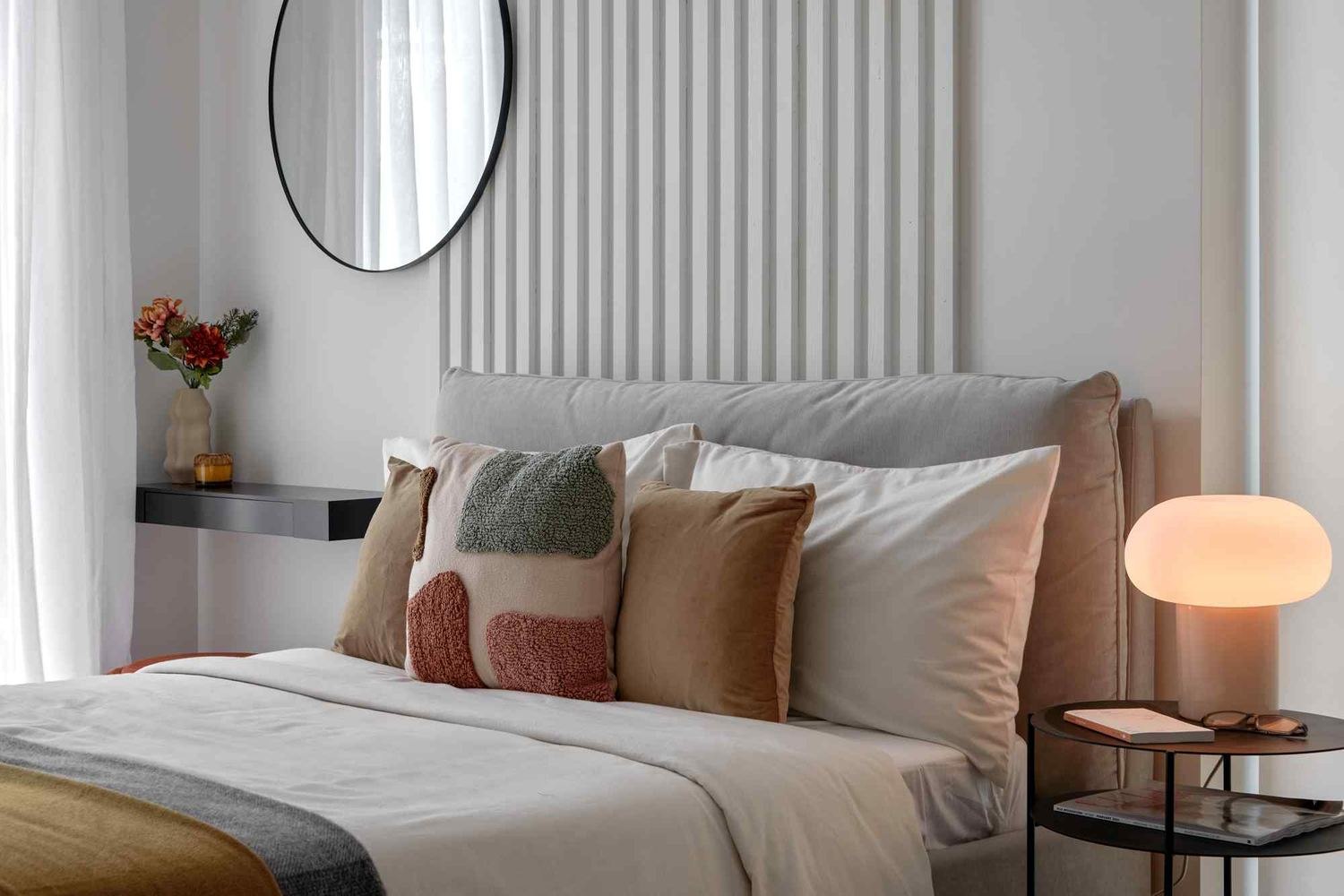 14 St Peter's Road show home bedroom with fluted panelling and round mirror, Croydon — show home styled by HDEY
