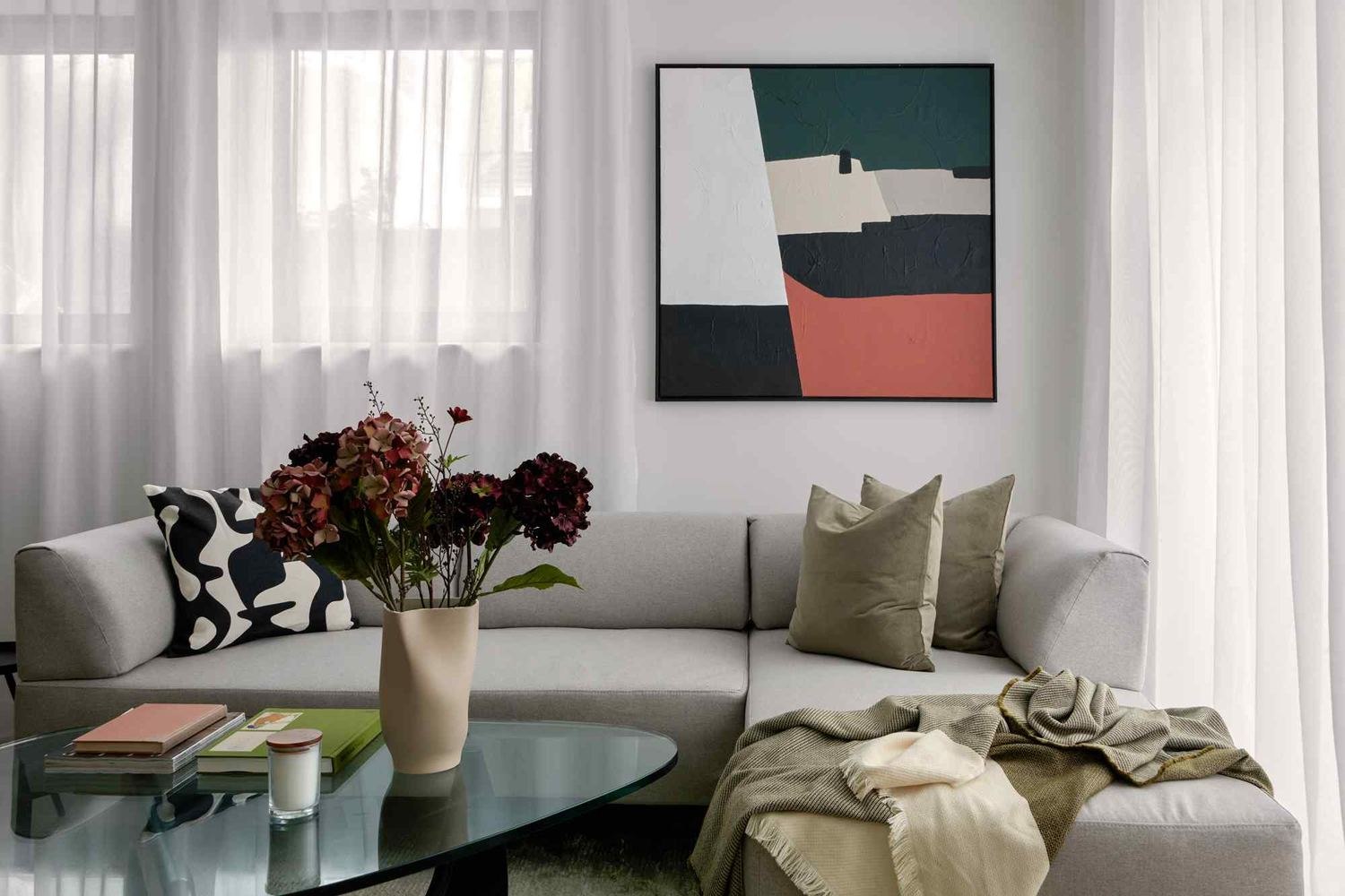 14 St Peter's Road show home living room with sofa and artwork, Croydon — styled by HDEY
