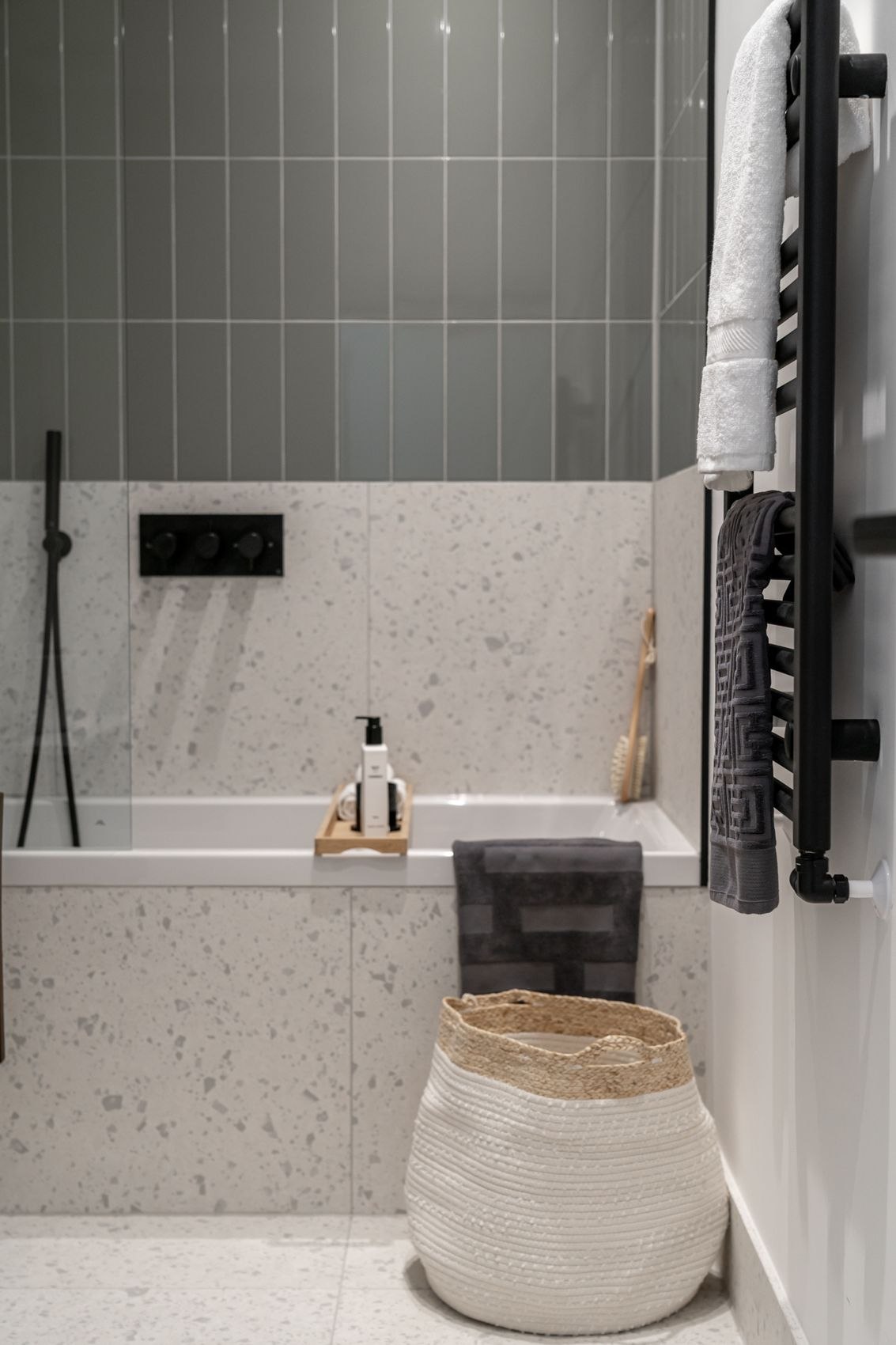 Streatley Road bathroom with sage green tile above terrazzo and black brassware, London, interior design by HDEY