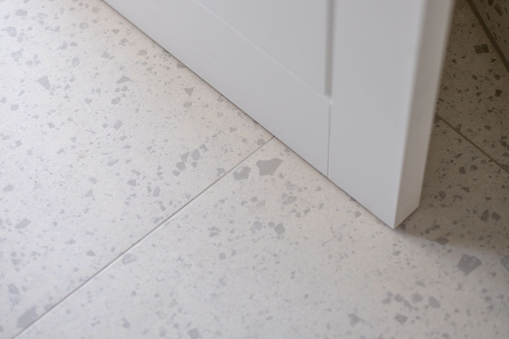 Streatley Road terrazzo floor meeting a fitted unit, London, specification by HDEY