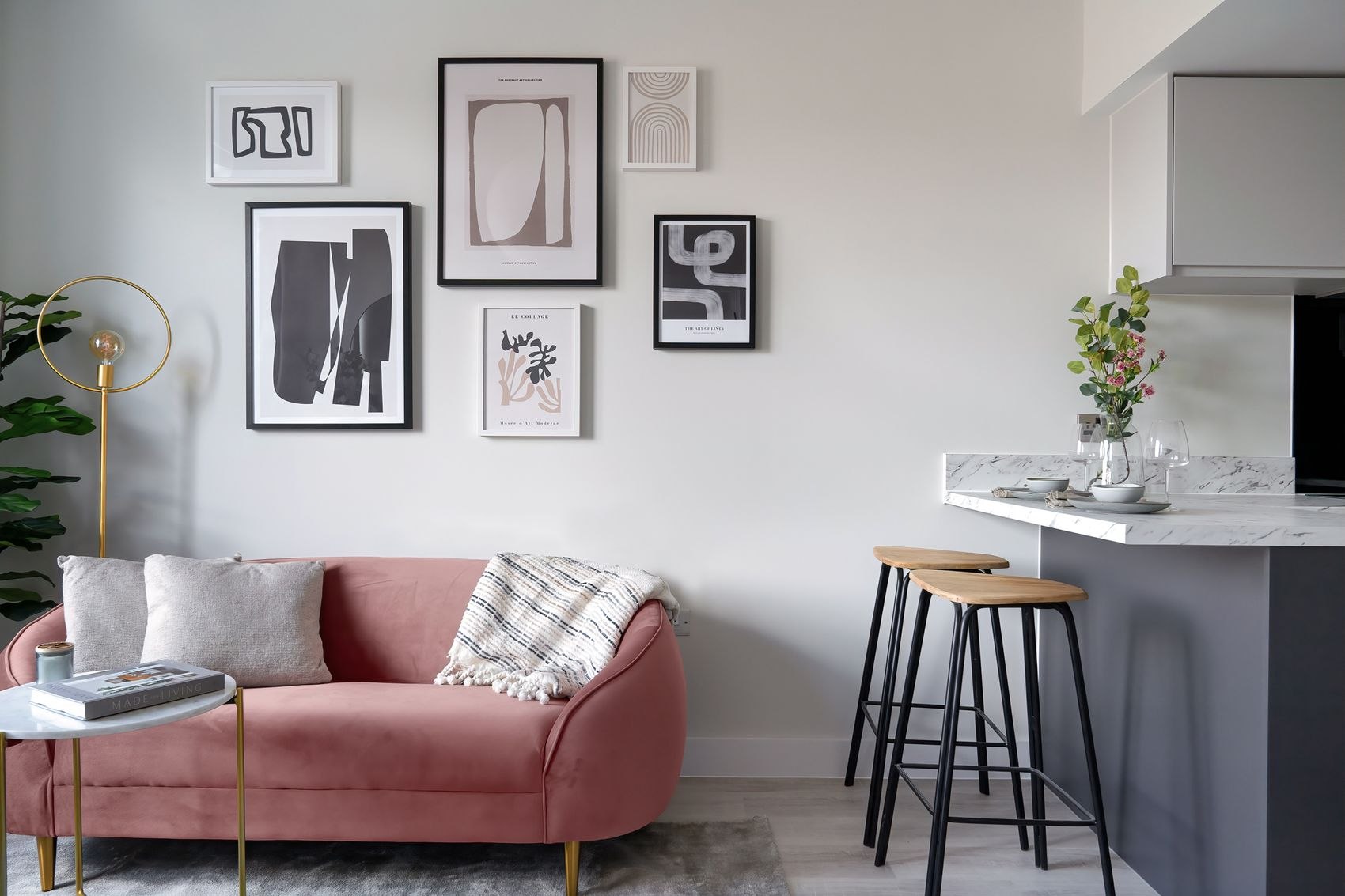 The Old Exchange show home living and kitchen area with pink velvet sofa and gallery wall, Kingswood, Bristol, by HDEY