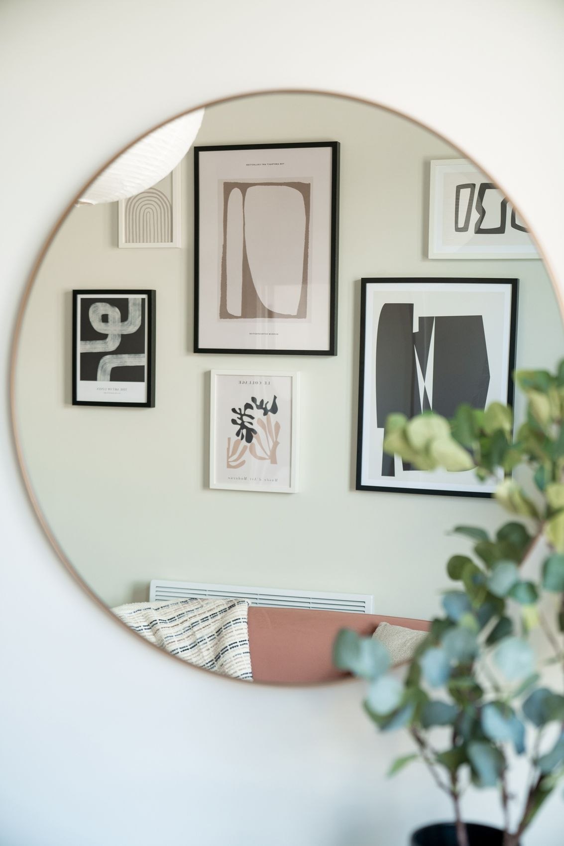 The Old Exchange show home round mirror reflecting a framed gallery wall, Kingswood, Bristol, by HDEY