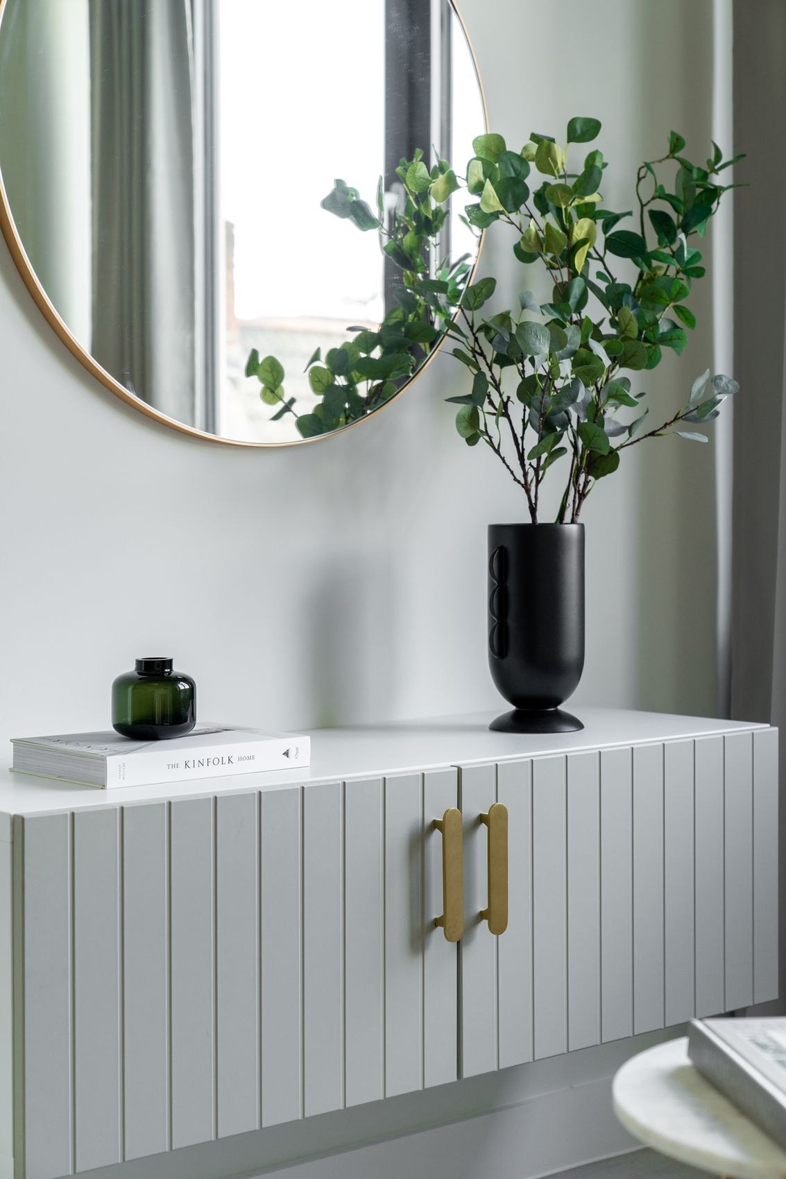 The Old Exchange show home fluted sideboard with brass handles and round mirror, Kingswood, Bristol, by HDEY
