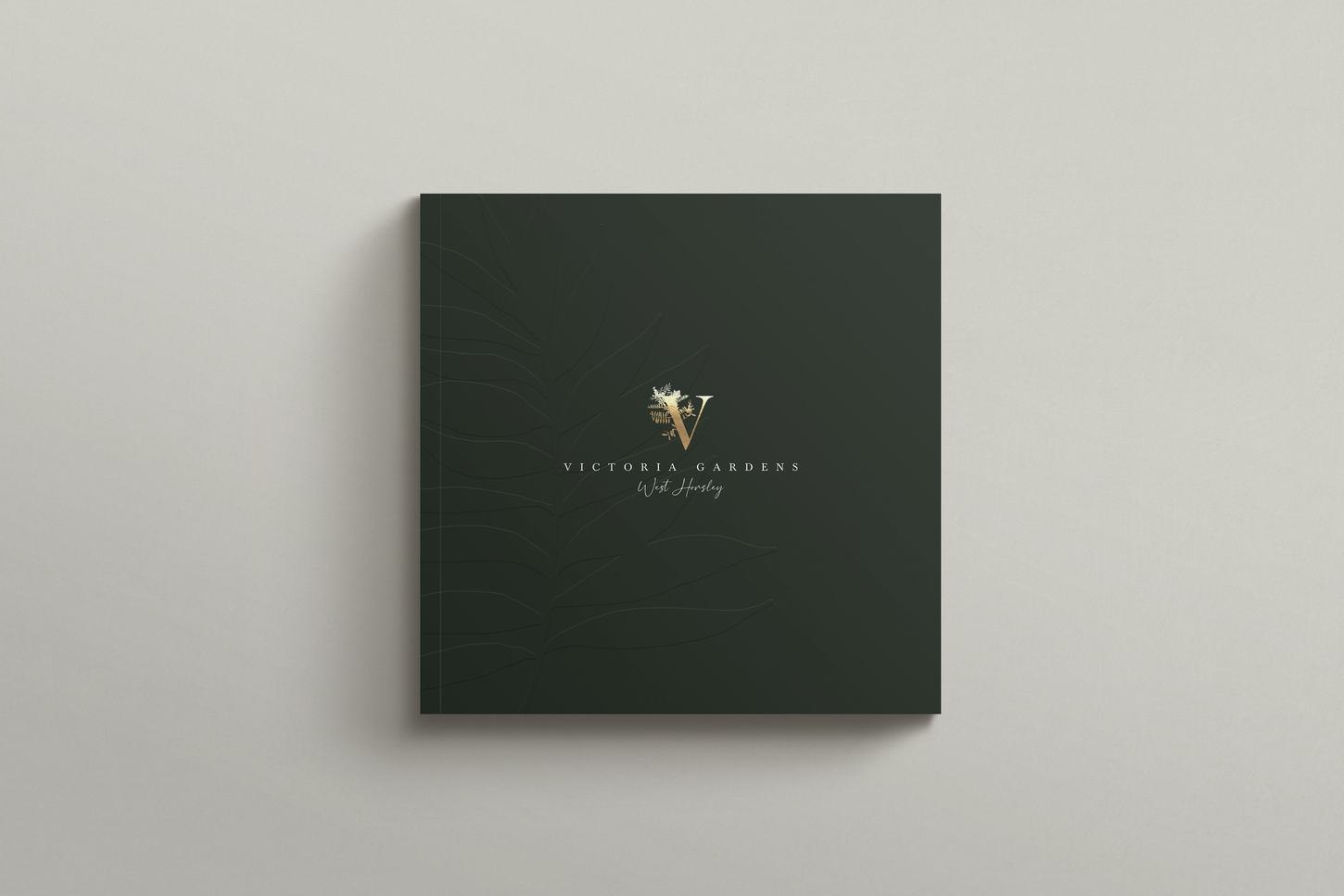Victoria Gardens brochure open at an exterior CGI spread, print design by HDEY