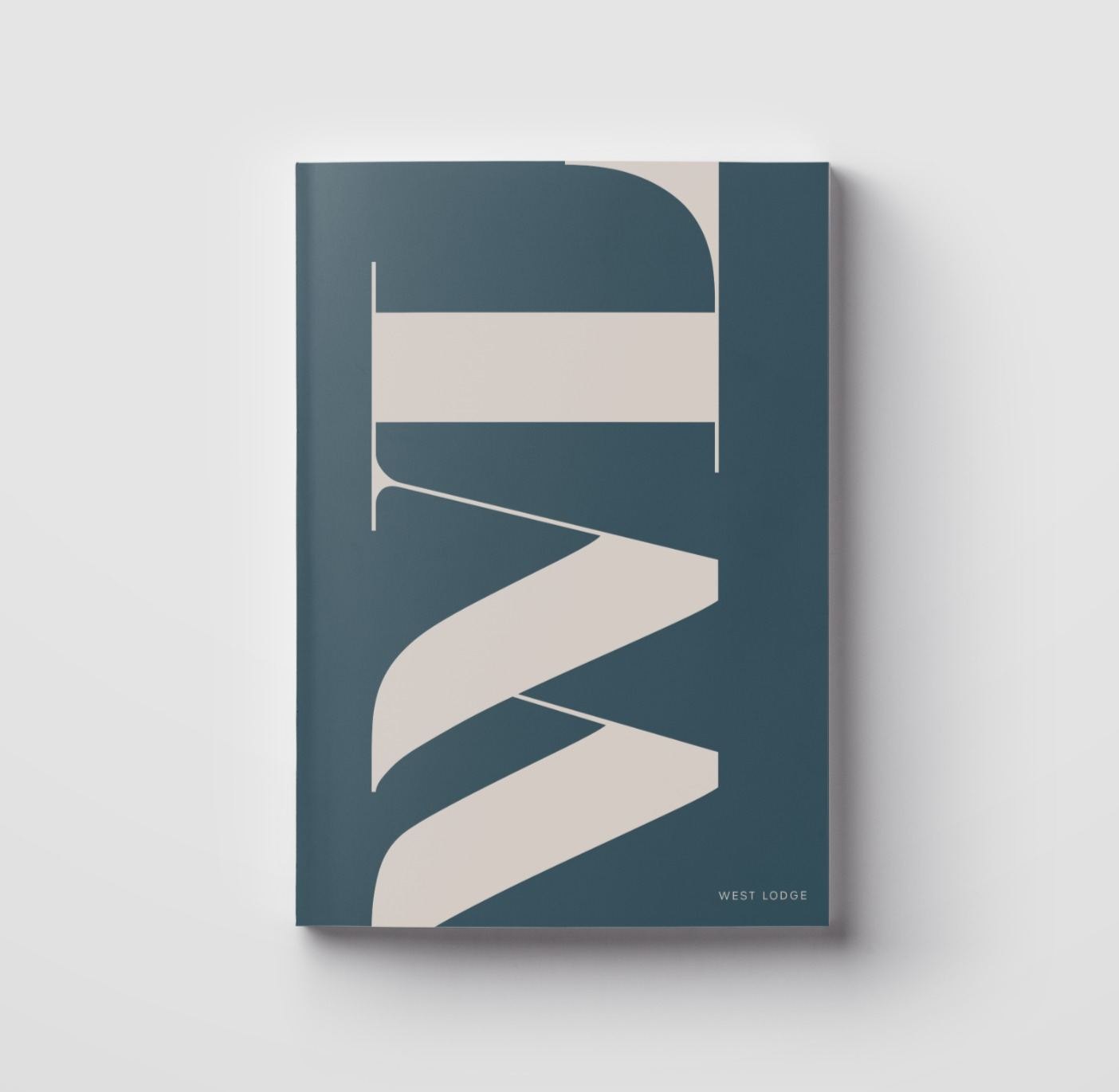 West Lodge brochure cover with the WL monogram in cream on deep teal, print design by HDEY