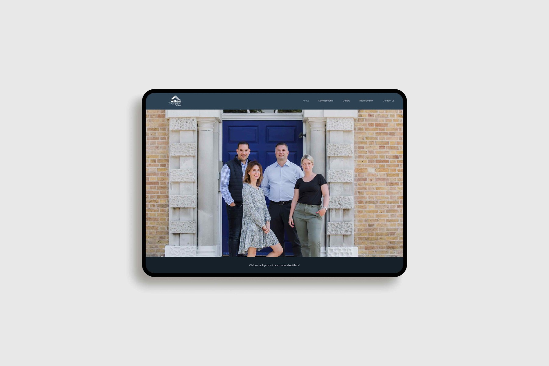 William Thompson Homes website homepage on tablet, showing the team photographed in a Georgian doorway, web design by HDEY