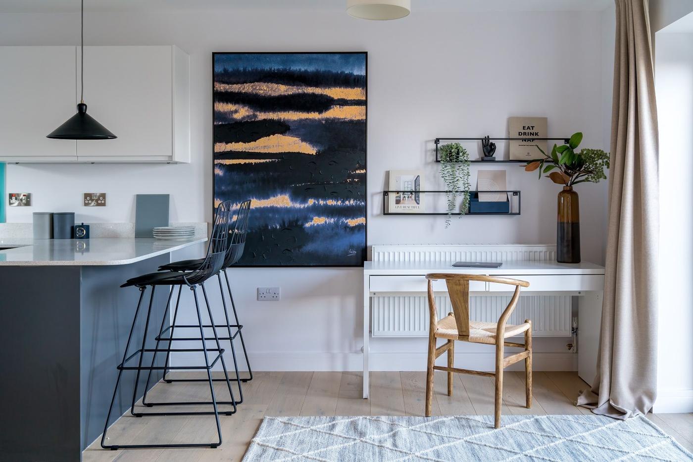 Windmill Park show home kitchen with dark island and bar seating, Launceston — by HDEY