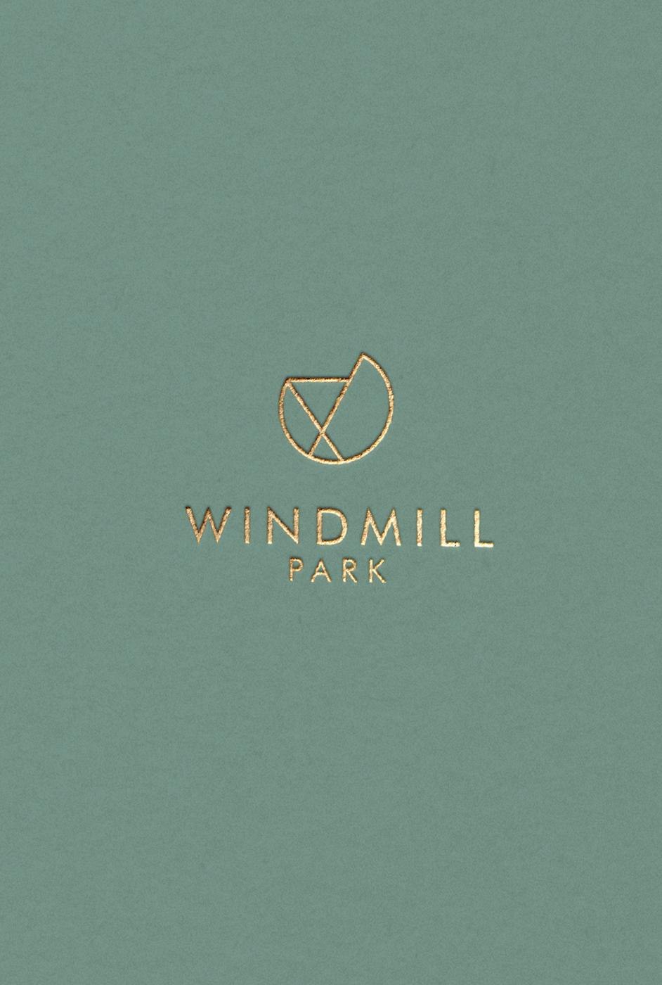 Windmill Park logo foiled in gold on sage green, brand identity by HDEY